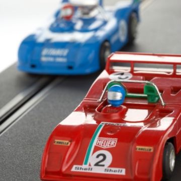 Toy Cars running on the track for kids